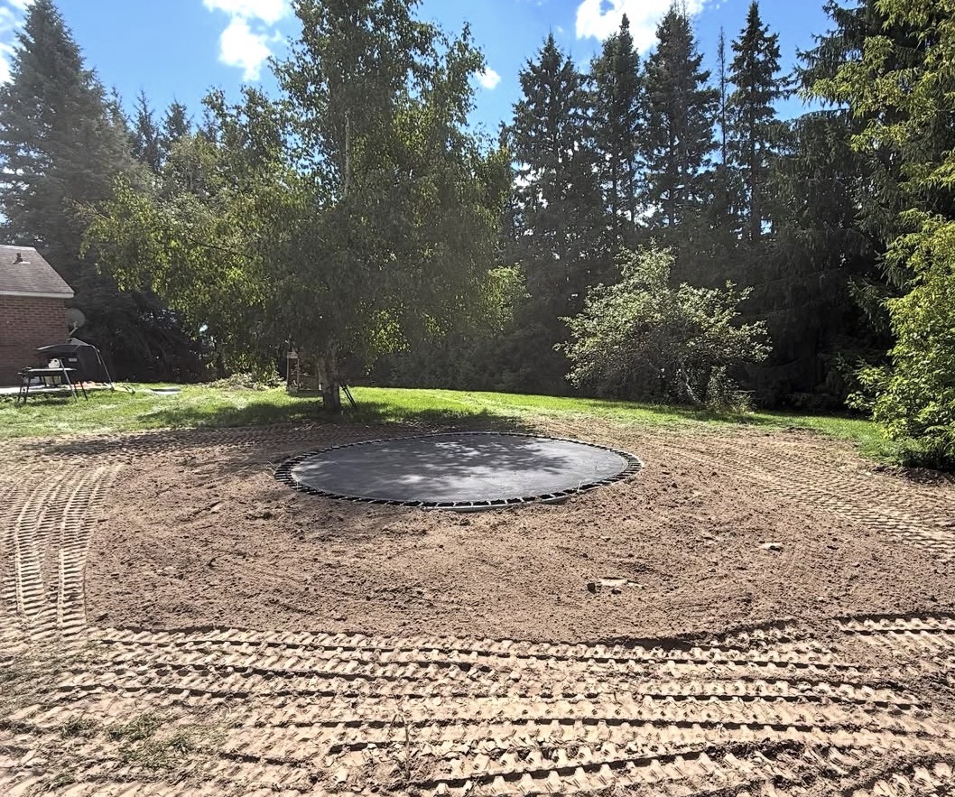After view of playground and trampoline area
